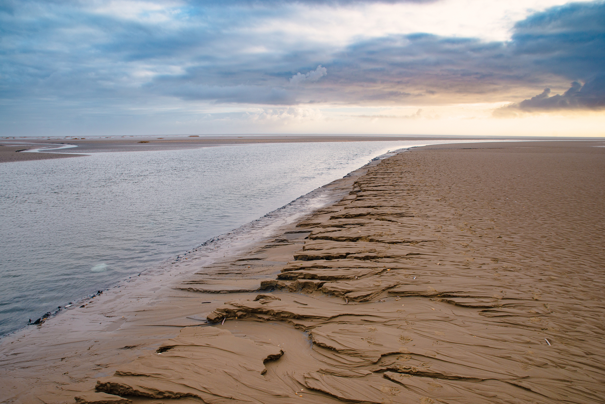Wadden sea at low tide, North sea beach landscape, coast on Fano island in Denmark